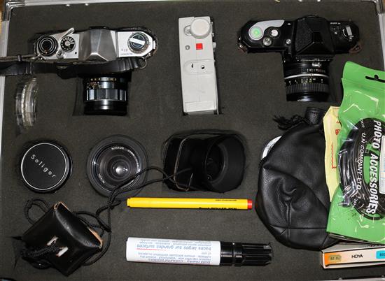 Pentax Asahi and Nikkormat cameras, in metal case with accessories